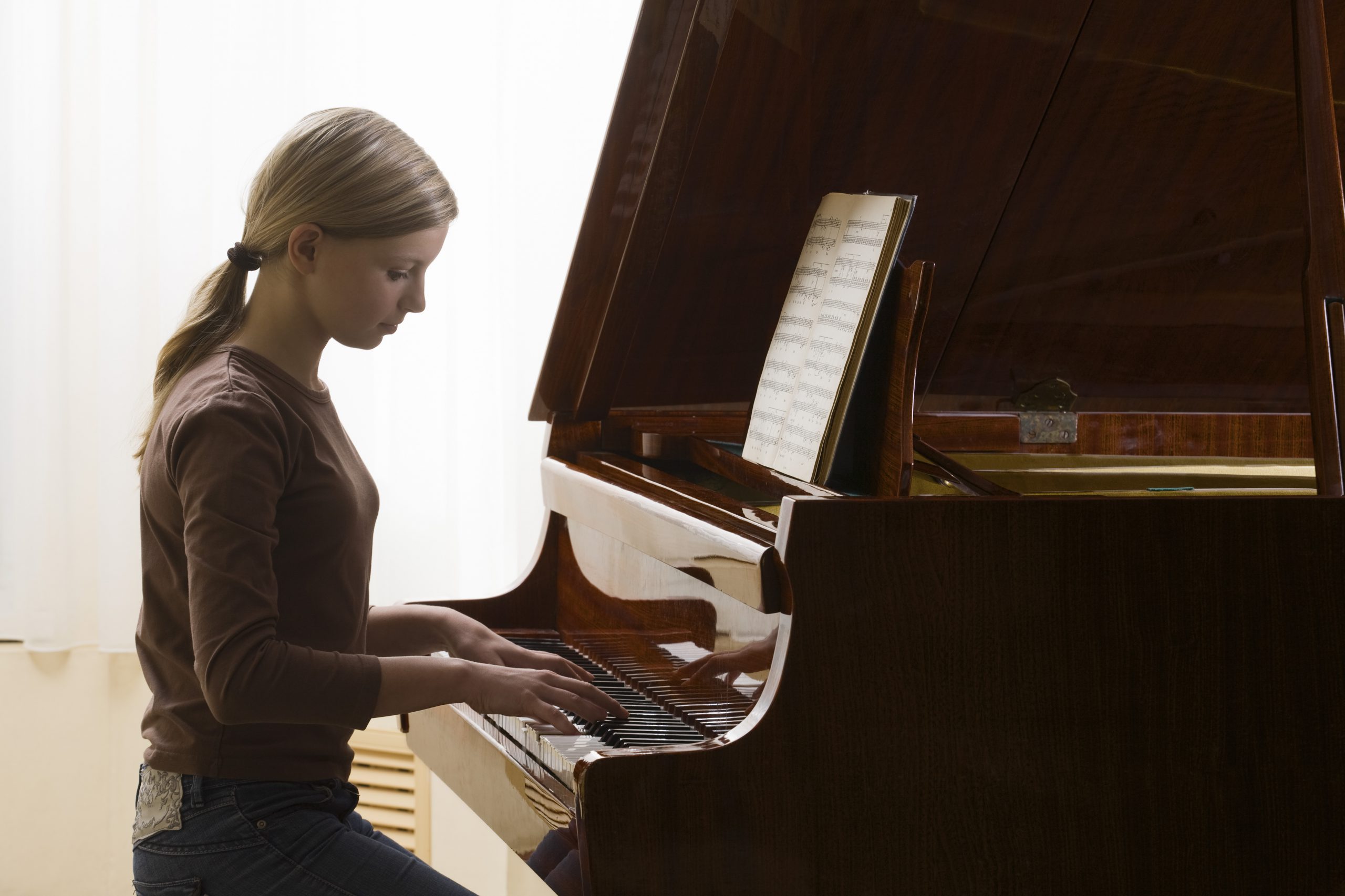 DeGazon Music Girl playing piano header image